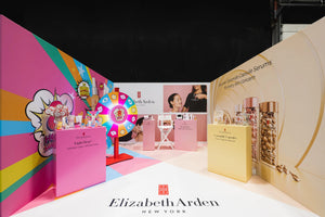 Premier Woodshop - Exhibition Stand Builders & Designers of the Elizabeth Arden Exhibition Stand featuring Wooden Plinths, Set, and Bespoke Prop.