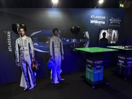 Formula One style light housings, 3D printed in-house and fitted with LEDs, on an exhibition stand